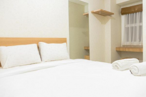 Minimalist 2BR Apartment at Parahyangan Residence By Travelio